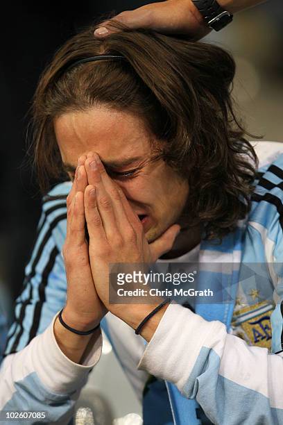 Dejected Argentina fan after being knocked out of the competition following the 2010 FIFA World Cup South Africa Quarter Final match between...