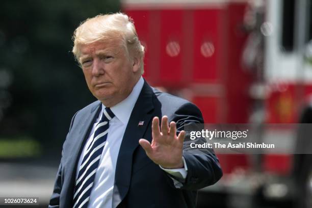 President Donald Trump walks toward Marine One while departing from the White House on August 31, 2018 in Washington, DC. President Trump is...