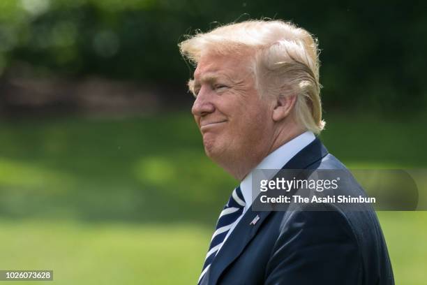 President Donald Trump walks toward Marine One while departing from the White House on August 31, 2018 in Washington, DC. President Trump is...