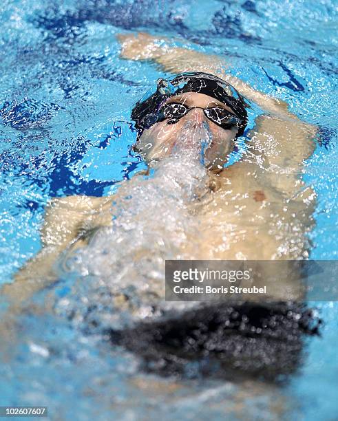 Yannick Lebherz of DSW 1912 Darmstadt competes in the men's 200 m backstroke A final during the German Swimming Championship 2010 at the...