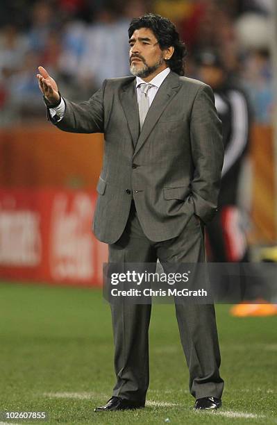 Diego Maradona head coach of Argentina gestures during the 2010 FIFA World Cup South Africa Quarter Final match between Argentina and Germany at...