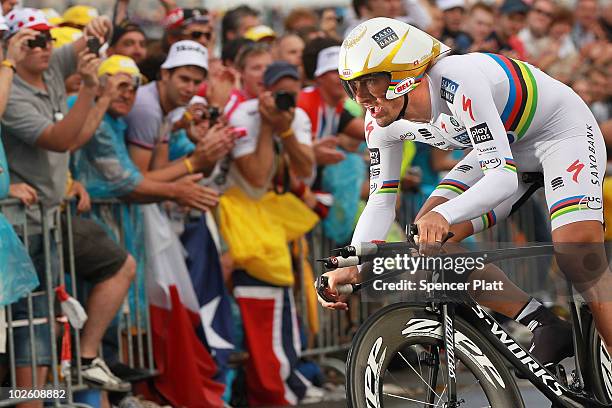 Swiss cyclist Fabian Cancellara races through an 8.9 time trial course during the prolouge for the 97th Tour de France on July 3, 2010 in Rotterdam,...