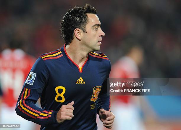 Spain's midfielder Xavi runs during the 2010 World Cup quarter-final football match between Paraguay and Spain on July 3, 2010 at Ellis Park stadium...