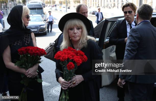 Russian pop star Alla Pugacheva , her husband Maksim Galkin and her daughter Kristina Orbakaite arrive for the funeral of Russian singer and State...