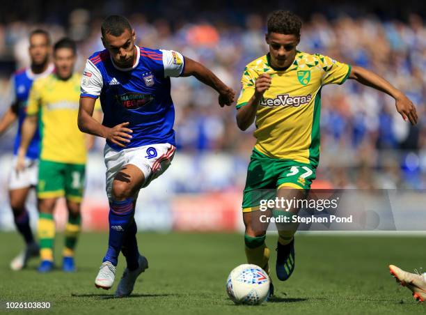 Max Aarons of Norwich City takes on Kayden Jackson of Ipswich Town during the Sky Bet Championship match between Ipswich Town and Norwich City at...