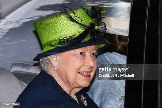 Queen Elizabeth II is driven from Crathie Kirk Church following the service on September 2, 2018 in Crathie, Aberdeenshire, Scotland. Queen Victoria...