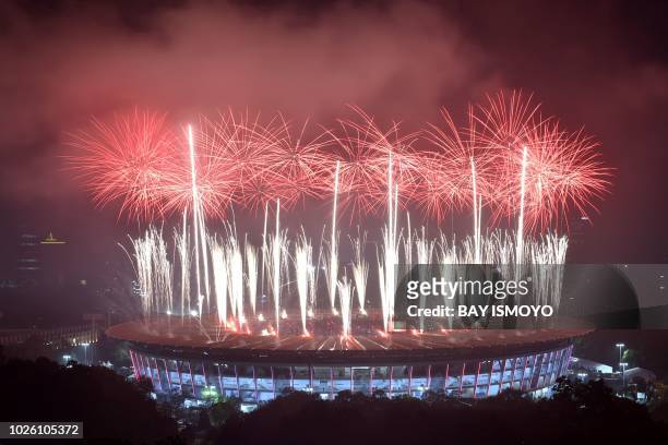 Fireworks explode over the Gelora Bung Karno main stadium during the closing ceremony of the 2018 Asian Games in Jakarta on September 2, 2018.