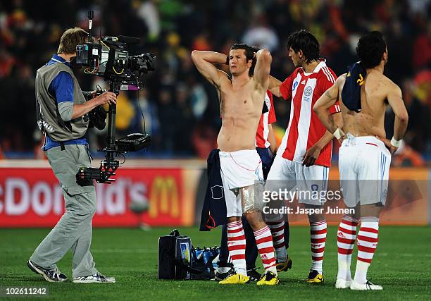 Dejected Nelson Valdez of Paraguay after being knocked out of the tournament during the 2010 FIFA World Cup South Africa Quarter Final match between...