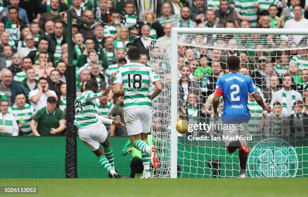 Olivier Ntcham of Celtic scores his team's opening goal the Scottish Premier League between Celtic and Rangers at Celtic Park Stadium on September 2,...
