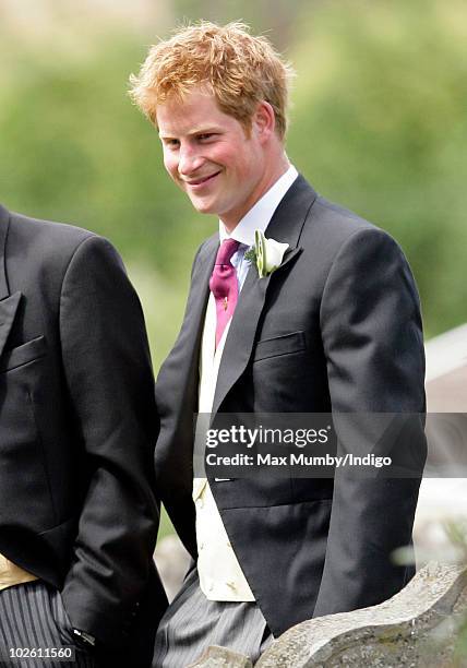 Prince Harry attends the wedding of Mark Dyer and Amanda Kline at St. Edmund's Church on July 3, 2010 in Abergavenny, Wales.