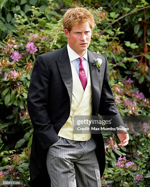 Prince Harry attends the wedding of Mark Dyer and Amanda Kline at St. Edmund's Church on July 3, 2010 in Abergavenny, Wales.