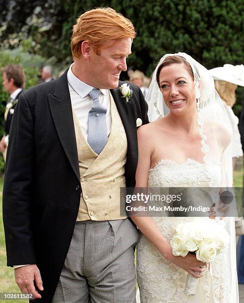 Mark Dyer and Amanda Kline leave St. Edmund's Church after their wedding on July 3, 2010 in Abergavenny, Wales.