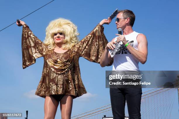 Lady Bunny and Neil Patrick Harris onstage during Wigstock 2018 at Pier 17 on September 1, 2018 in New York City.