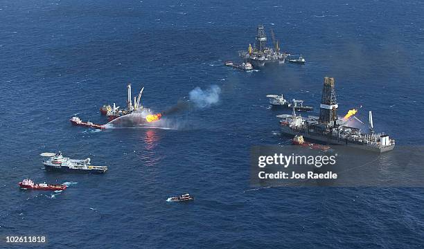 Support ships are seen near the Discoverer Enterprise drilling rig as they continue the effort to recover oil from the Deepwater Horizon spill site...