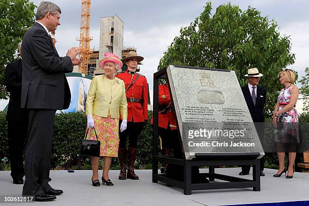 Queen Elizabeth II unveils a cornerstone as she arrives at the site for Canadian Museum of Human Rights as Prince Philip, Duke of Edinburgh and Prime...