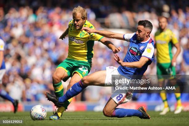 Teemu Pukki of Norwich City and Cole Skuse of Ipswich Town during the Sky Bet Championship match between Ipswich Town and Norwich City at Portman...