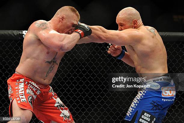 Brock Lesnar and Shane Carwin exchange blows during the UFC Heavyweight Championship Unification bout at the MGM Grand Garden Arena on July 3, 2010...