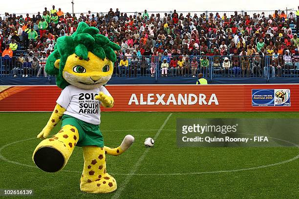 Zakumi entertains the crowd at the Football For Hope Festival Opening Ceremony on July 4, 2010 in Johannesburg, South Africa.