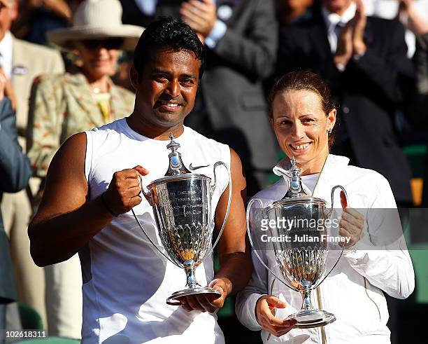 Leander Paes of India and Cara Black of Zimbabwe celebrate winning their Mixed Doubles Final match against Wesley Moodie of South Africa and Lisa...