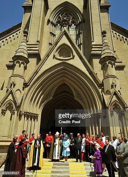 Queen Elizabeth II and Prince Philip, Duke of Edinburgh talk to well-wishers after attending the Sunday service at the St James Cathedral Church on...
