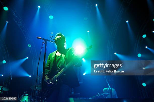 Dougy Mandagi of australian alternative rock band The Temper Trap performs on day 4 at the 40th Roskilde Festival on July 4, 2010 in Roskilde,...