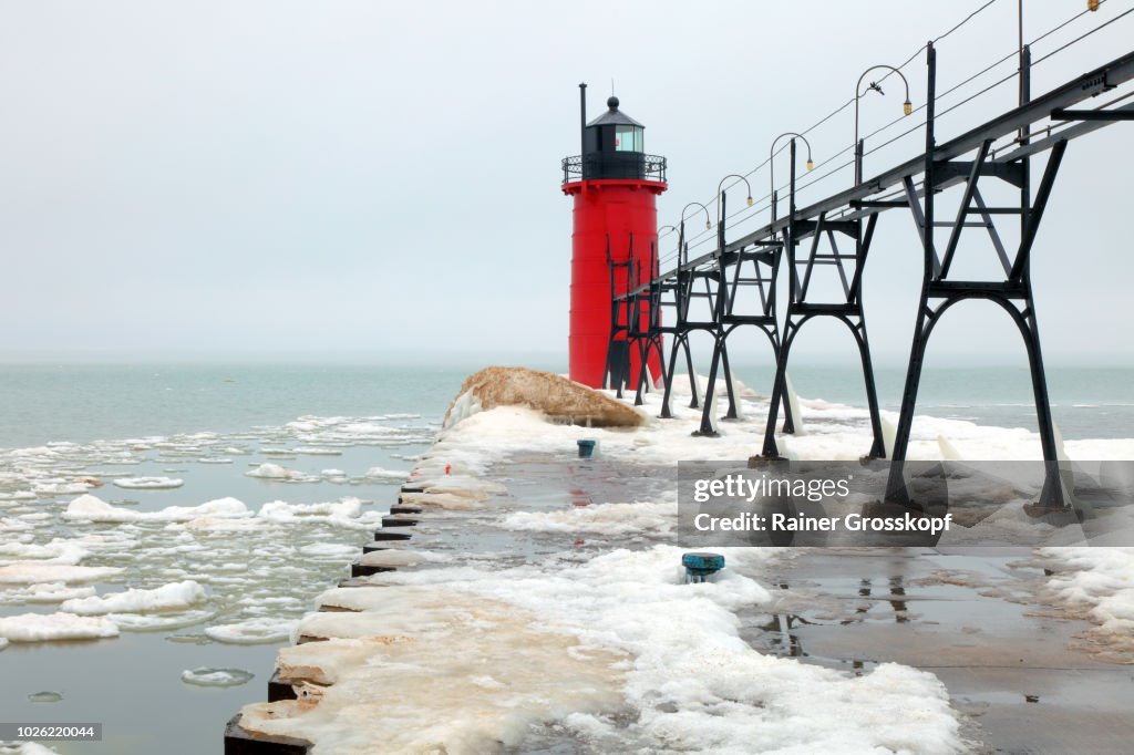 South Haven Pierhead Lighthouse on Lake Michigan in winter