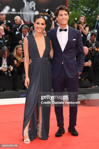 Ana Moya Calzado and guest walk the red carpet ahead of the 'The Sisters Brothers' screening during the 75th Venice Film Festival at Sala Grande on...