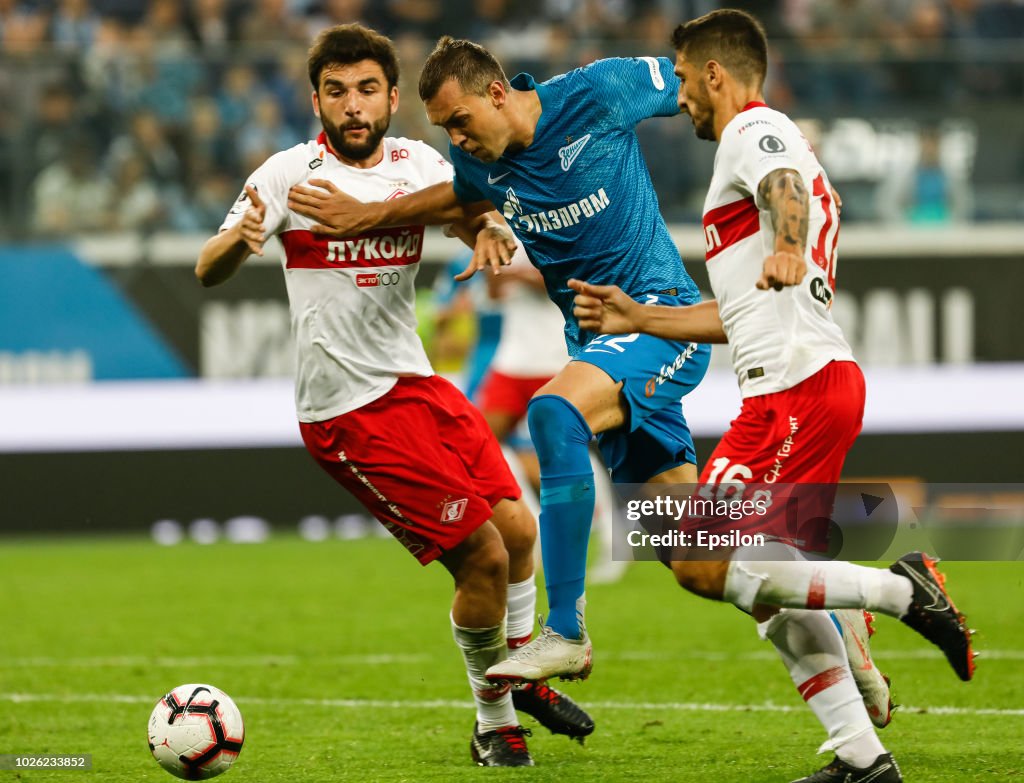 Artem Dzyuba Of FC Zenit Saint Petersburg Vies For The Ball With artem-dzyuba-of-fc-zenit-saint-petersburg-vies-for-the-ball-with