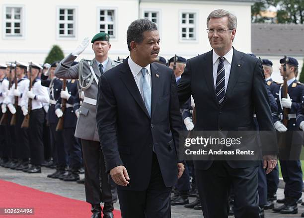 German President Christian Wulff and Leonel Fernandez Reyna , President of the Dominican Republic, look on after they review a guard of honour upon...