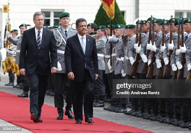 German President Christian Wulff and Leonel Fernandez Reyna , President of the Dominican Republic review a guard of honour upon Reyna's arrival at...