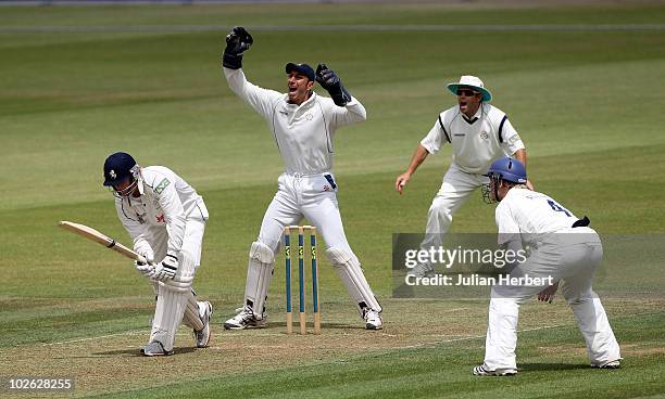 Nic Pothas of Hampshire appeals in vain for the wicket of Sam Northeast during the LV County Championship match between Hampshire and Kent at The...