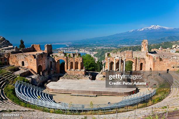 the greek theater & mount etna, sicily, italy - teatro greco taormina bildbanksfoton och bilder