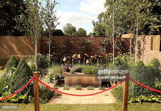 General view of the show garden 'Snow White's Slumber' during the press preview day of the Hampton Court Palace Flower Show on July 5, 2010 in...