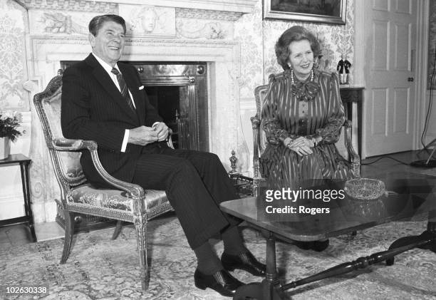 President Ronald Reagan sits with British Prime Minister Margaret Thatcher at 10 Downing Street, London on June 05, 1984.
