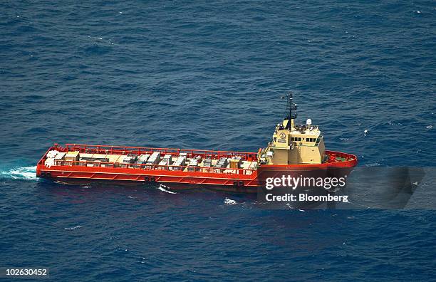 The Dante, a vessel owned by Edison Chouest Offshore, works at the site of the BP Plc Deepwater Horizon oil spill in the Gulf of Mexico off the coast...