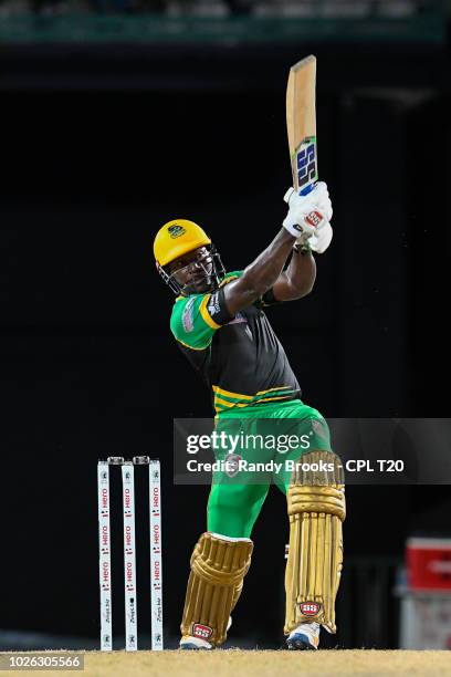 In this handout image provided by CPL T20, Rovman Powell of Jamaica Tallawahs hits 6 during match 25 of the Hero Caribbean Premier League between St...