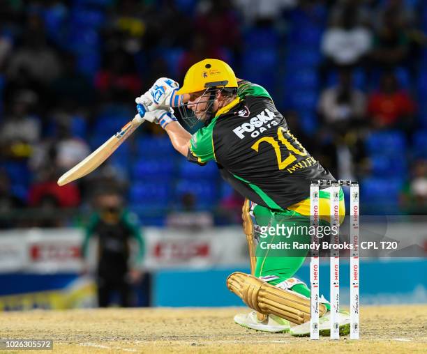 In this handout image provided by CPL T20, David Miller of Jamaica Tallawahs hits 4 during match 25 of the Hero Caribbean Premier League between St...