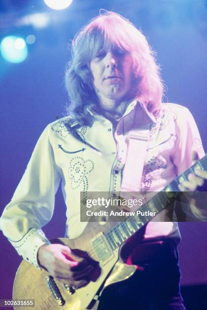 Mick Ralphs of Bad Company performs on stage at Olympia in London, England on December 31, 1975.