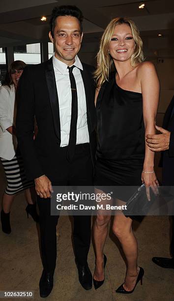 Jamie Hince and Kate Moss attend the private view of 'Mario Testino: Kate Who?', at Phillips de Pury & Company on July 5, 2010 in London, England.