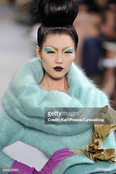 Model walks the runway during the Christian Dior fashion show at Paris Haute Couture Fashion Week for Autumn Winter 2010 on July 5, 2010 in Paris,...