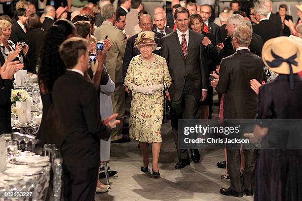 Queen Elizabeth II and Prince Philip, Duke of Edinburgh arrive for lunch during a visit to Pinewood Studios on July 5, 2010 in Toronto, Canada. The...