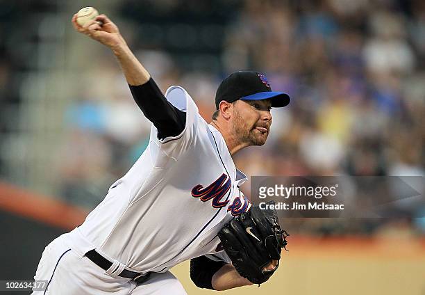 Mike Pelfrey of the New York Mets delivers a pitch against the Cincinnati Reds on July 5, 2010 at Citi Field in the Flushing neighborhood of the...