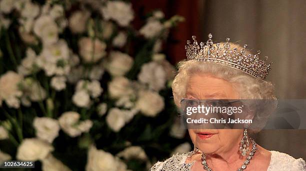 Queen Elizabeth II gives a speech during a dinner at the Royal York Hotel on July 5, 2010 in Toronto, Canada. The Queen and Duke of Edinburgh are on...