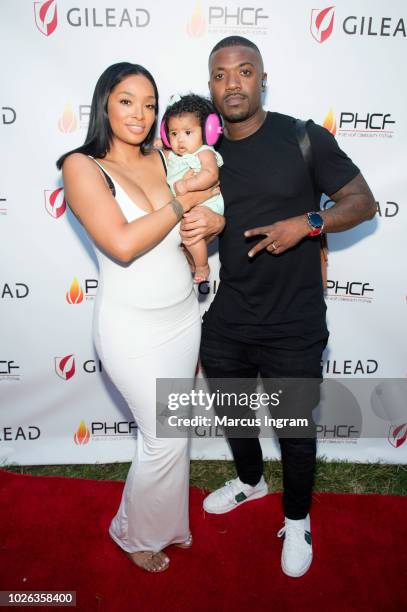 Princess Love, Ray J and their daughter Melody Love attend the 2018 Pure Heat Community Festival at Piedmont Park on September 2, 2018 in Atlanta,...