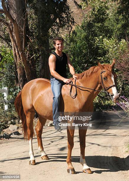 Elite Equestrian Rider Nick Haness with horse Deniro poses during a photo shoot on July 5, 2010 in Silverado, California.