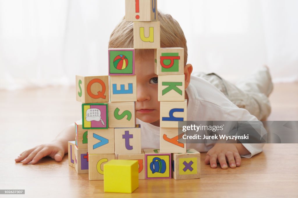 Young Boy Playing with blocks