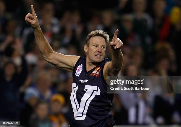 Sam Newman celebrates after kicking a goal during the 2010 EJ Whitten Legends AFL Game between Victoria and the All Stars at Etihad Stadium on July...
