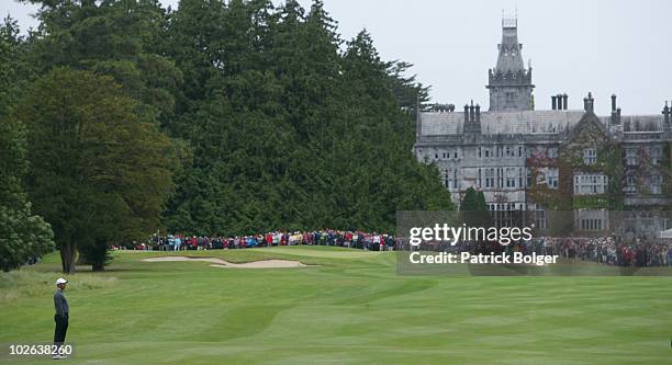 Tiger Woods stands on the 8th fairway during the second round of The JP McManus Invitational Pro-Am event at the Adare Manor Hotel and Golf Resort on...