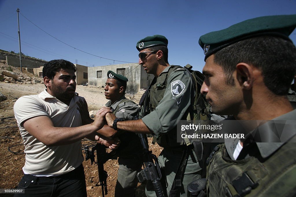 A Palestinian farmer, whose agriculture