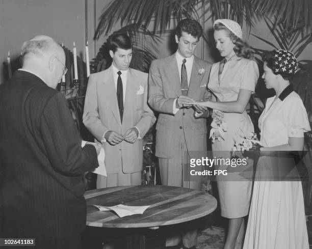 American actors Tony Curtis and Janet Leigh get married in Greenwich, Connecticut, 4th June 1951. With them are comedian Jerry Lewis and his wife...